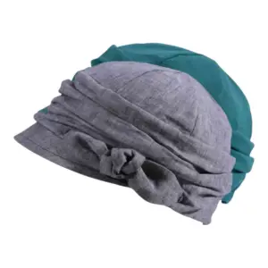 Ballonmütze aus Leinen für Damen und Mädchen in Schwarz meliert oder Petrol mit Schleifendetail|Ballonmütze aus Leinen für Damen und Mädchen in Schwarz meliert oder Petrol mit Schleifendetail|Ballonmütze aus Leinen für Damen und Mädchen in Schwarz meliert oder Petrol mit Schleifendetail|||